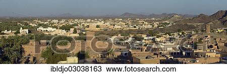 "The oasis town of Al-Mundayrib with its old fortifications, Al-Mudayrib, Ash Sharqiyah, Oman, Asia" View Large Photo Image Stock Image - "The oasis town of Al-Mundayrib with its old fortifications, Al-Mudayrib, Ash Sharqiyah, Oman, Asia". Fotosearch