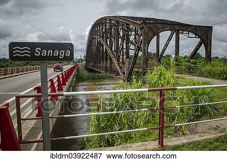 Stock Photo - "The old arched bridge, built in 1903, now closed to road traffic, from the German colonial era, made in Oberhausen and assembled on site, Edea, Littoral Region, Cameroon, Africa". Fotosearch