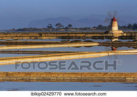 "The old saltworks in the Laguna dello Stagnone near Trapani, in evening light, Sicily, Italy, Europe" View Large Photo Image Stock Image - "The old saltworks in the Laguna dello Stagnone near Trapani, in evening light, Sicily, Italy, Europe". Fotosearch