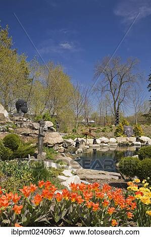 "The ornamental pond in the Zen garden at springtime in the """"Route des Gerbes d'Angelica"""" garden in Mirabel, Laurentians, Quebec, Canada - This image is property released for book, calendar, magazine, newspaper and editorial use only. " View Large Photo Image Stock Photo - "The ornamental pond in the Zen garden at springtime in the """"Route des Gerbes d'Angelica"""" garden in Mirabel, Laurentians, Quebec, Canada - This image is property released for book, calendar, magazine, newspaper and editorial use only. ". Fotosearch