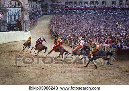 Stock Image - "The Palio di Siena horse race on Piazza del Campo, Siena, Tuscany, Italy, Europe". Fotosearch