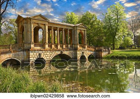 "The Palladian Bridge, 1774, designed by James Gibbs over the lake in the English landscape gardens of Stowe, designed by Capability Brown, Buckingham, England, United Kingdom, Europe" View Large Photo Image Stock Photo - "The Palladian Bridge, 1774, designed by James Gibbs over the lake in the English landscape gardens of Stowe, designed by Capability Brown, Buckingham, England, United Kingdom, Europe". Fotosearch