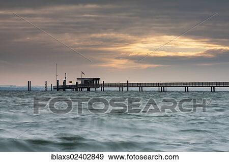 Stock Photo - "The pier at sunrise in Altnau on Lake Constance, Canton Thurgau, Switzerland, Europe, PublicGround, Europe". Fotosearch