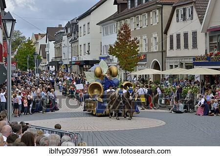 Stock Image - "The Plums Queen Alina I. takes part in the parade of the Zwetschgenfest, plums festival, Buhl, Baden, Baden-Wurttemberg, Germany, Europe". Fotosearch