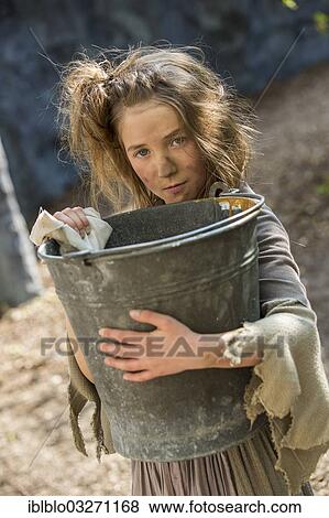 "The poor girl Cosette, Les Miserables - theatre version of the novel by Victor Hugo, Waldbuehne Heessen open-air theatre, Heessen, Hamm, North Rhine-Westphalia, Germany, Europe" View Large Photo Image Stock Photo - "The poor girl Cosette, Les Miserables - theatre version of the novel by Victor Hugo, Waldbuehne Heessen open-air theatre, Heessen, Hamm, North Rhine-Westphalia, Germany, Europe". Fotosearch