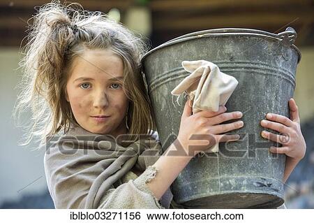 "The poor girl Cosette, Les Miserables - theatre version of the novel by Victor Hugo, Waldbuehne Heessen open-air theatre, Heessen, Hamm, North Rhine-Westphalia, Germany, Europe" View Large Photo Image Stock Photograph - "The poor girl Cosette, Les Miserables - theatre version of the novel by Victor Hugo, Waldbuehne Heessen open-air theatre, Heessen, Hamm, North Rhine-Westphalia, Germany, Europe". Fotosearch