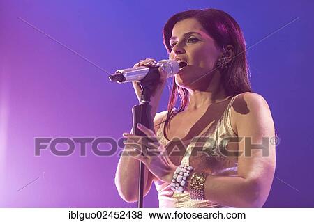 Stock Photo - "The Portuguese-Canadian singer Nelly Furtado performing live at Energy Stars For Free event, Hallenstadion Zuerich hall, Zurich, Switzerland, Europe". Fotosearch