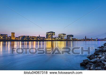 "The Rhine with the Crane Houses at dusk, Cologne, North Rhine-Westphalia, Germany, Europe" View Large Photo Image Stock Photo - "The Rhine with the Crane Houses at dusk, Cologne, North Rhine-Westphalia, Germany, Europe". Fotosearch