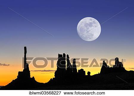 "The rock formations Totem Pole and Yei Bi Chei, silhouetted before sunrise, with moon, composite image, Monument Valley, Navajo Tribal Park, Arizona, United States, North America" View Large Photo Image Stock Photo - "The rock formations Totem Pole and Yei Bi Chei, silhouetted before sunrise, with moon, composite image, Monument Valley, Navajo Tribal Park, Arizona, United States, North America". Fotosearch