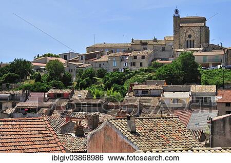 Stock Photograph - "The roofs of the historic centre and the Church of Saint-Denis, Valensole, Departement Alpes-de-Haute-Provence, Provence-Alpes-Cote d'Azur, France, Europe". Fotosearch