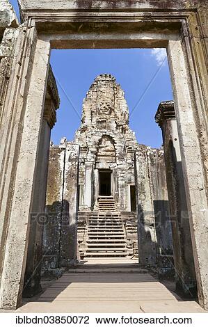 Stock Image - "The ruins of the Bayon temple as seen from the southern entrance, Angkor Thom, Angkor, Siem Reap, Cambodia, Asia". Fotosearch