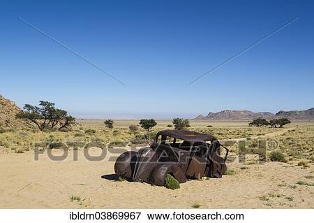 "The rusty wreck of a Hudson Terraplane, built in 1934, this vintage car is said to have served diamond robbers as a getaway vehicle, Geisterschlucht, Aus, Karas Region, Namibia, Africa" View Large Photo Image Stock Photo - "The rusty wreck of a Hudson Terraplane, built in 1934, this vintage car is said to have served diamond robbers as a getaway vehicle, Geisterschlucht, Aus, Karas Region, Namibia, Africa". Fotosearch