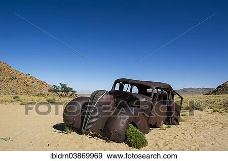 "The rusty wreck of a Hudson Terraplane, built in 1934, this vintage car is said to have served diamond robbers as a getaway vehicle, Geisterschlucht, Aus, Karas Region, Namibia, Africa" View Large Photo Image Stock Photo - "The rusty wreck of a Hudson Terraplane, built in 1934, this vintage car is said to have served diamond robbers as a getaway vehicle, Geisterschlucht, Aus, Karas Region, Namibia, Africa". Fotosearch