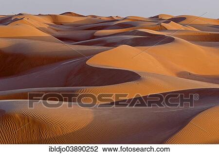 "The sand dunes of the Wahiba Sands desert, also known as Ramlat al-Wahiba or Sharqiya Sands, in evening light, Hawiyah, Ash Sharqiyah, Oman, Asia" View Large Photo Image Stock Image - "The sand dunes of the Wahiba Sands desert, also known as Ramlat al-Wahiba or Sharqiya Sands, in evening light, Hawiyah, Ash Sharqiyah, Oman, Asia". Fotosearch
