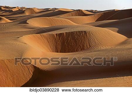"The sand dunes of the Wahiba Sands desert, also known as Ramlat al-Wahiba or Sharqiya Sands, in evening light, Hawiyah, Ash Sharqiyah, Oman, Asia" View Large Photo Image Stock Photo - "The sand dunes of the Wahiba Sands desert, also known as Ramlat al-Wahiba or Sharqiya Sands, in evening light, Hawiyah, Ash Sharqiyah, Oman, Asia". Fotosearch