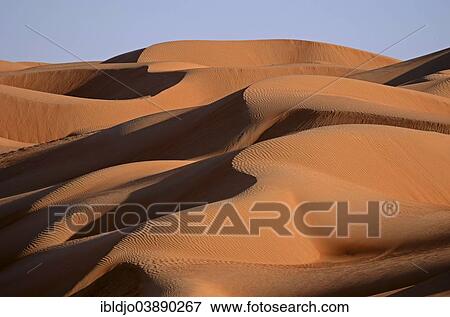 "The sand dunes of the Wahiba Sands desert, also known as Ramlat al-Wahiba or Sharqiya Sands, in evening light, Hawiyah, Ash Sharqiyah, Oman, Asia" View Large Photo Image Stock Photo - "The sand dunes of the Wahiba Sands desert, also known as Ramlat al-Wahiba or Sharqiya Sands, in evening light, Hawiyah, Ash Sharqiyah, Oman, Asia". Fotosearch