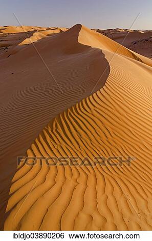 "The sand dunes of the Wahiba Sands desert, also known as Ramlat al-Wahiba or Sharqiya Sands, in evening light, Hawiyah, Ash Sharqiyah, Oman, Asia" View Large Photo Image Stock Photograph - "The sand dunes of the Wahiba Sands desert, also known as Ramlat al-Wahiba or Sharqiya Sands, in evening light, Hawiyah, Ash Sharqiyah, Oman, Asia". Fotosearch