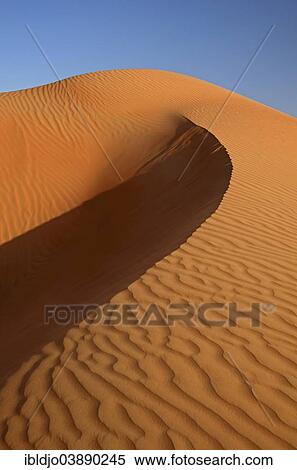 "The sand dunes of the Wahiba Sands desert, also known as Ramlat al-Wahiba or Sharqiya Sands, in evening light, Hawiyah, Ash Sharqiyah, Oman, Asia" View Large Photo Image Stock Photography - "The sand dunes of the Wahiba Sands desert, also known as Ramlat al-Wahiba or Sharqiya Sands, in evening light, Hawiyah, Ash Sharqiyah, Oman, Asia". Fotosearch