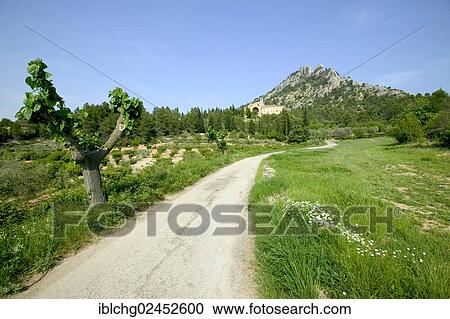 Stock Image - "The Santa Barbara mountain and the Sant Salvador monastery, Horta de Sant Joan, Catalonia, Spain, Europe". Fotosearch