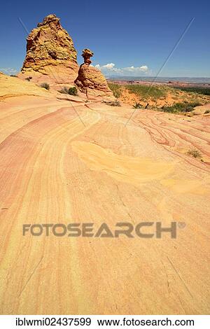 "The Sentinel, Brain Rocks of the Coyote Buttes South CBS, Cottonwood Teepees, eroded Navajo sandstone rocks with Liesegang bands or Liesegang rings, Pareah Paria Plateau, Vermilion Cliffs National Monument, Arizona, Utah, Southwest, USA" View Large Photo Image Stock Photo - "The Sentinel, Brain Rocks of the Coyote Buttes South CBS, Cottonwood Teepees, eroded Navajo sandstone rocks with Liesegang bands or Liesegang rings, Pareah Paria Plateau, Vermilion Cliffs National Monument, Arizona, Utah, Southwest, USA". Fotosearch
