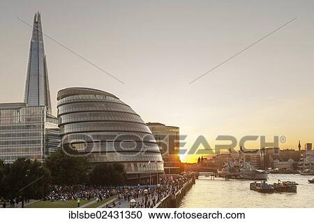Stock Image - "The Shard Tower, City Hall, River Thames, view from Tower Bridge at dusk, London, England, United Kingdom, Europe". Fotosearch