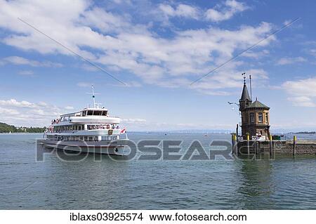 "The ship Vorarlberg pulls into the harbor of Constance, with a view of the Upper Lake Constance, Baden-Wuerttemberg, Germany, Europe" View Large Photo Image Picture - "The ship Vorarlberg pulls into the harbor of Constance, with a view of the Upper Lake Constance, Baden-Wuerttemberg, Germany, Europe". Fotosearch