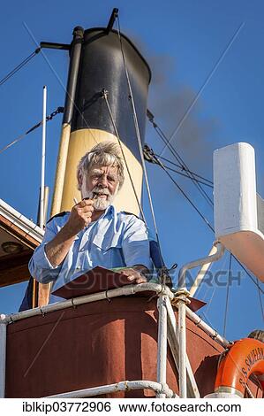 "The skipper of the old steamer SS Skjelskor, Frederikssund, Zealand, Denmark, Europe" View Large Photo Image Stock Photograph - "The skipper of the old steamer SS Skjelskor, Frederikssund, Zealand, Denmark, Europe". Fotosearch