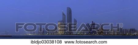 "The skyline of Abu Dhabi at dusk, Abu Dhabi, Emirate of Abu Dhabi, United Arab Emirates, Asia" View Large Photo Image Stock Photo - "The skyline of Abu Dhabi at dusk, Abu Dhabi, Emirate of Abu Dhabi, United Arab Emirates, Asia". Fotosearch