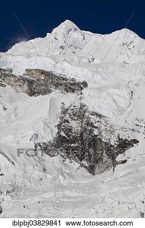 "The snow-covered mountain Nevado Chopicalqui, Cordillera Blanca, Peru, South America" View Large Photo Image Stock Image - "The snow-covered mountain Nevado Chopicalqui, Cordillera Blanca, Peru, South America". Fotosearch