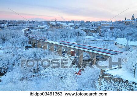 "The snowy city of Luxembourg with the aqueduct at dusk, Luxembourg, Luxembourg District, Luxembourg, Europe" View Large Photo Image Stock Image - "The snowy city of Luxembourg with the aqueduct at dusk, Luxembourg, Luxembourg District, Luxembourg, Europe". Fotosearch