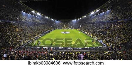 "The sold-out Signal Iduna Arena before the kickoff of the UEFA Champions League game Borussia Dortmund vs Arsenal, Dortmund, North Rhine-Westphalia, Germany, Europe" View Large Photo Image Stock Photograph - "The sold-out Signal Iduna Arena before the kickoff of the UEFA Champions League game Borussia Dortmund vs Arsenal, Dortmund, North Rhine-Westphalia, Germany, Europe". Fotosearch