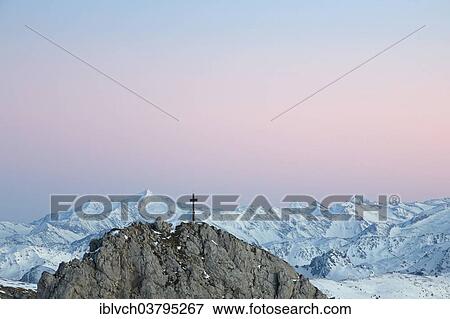 "The summit cross of the Haidachstellwand, behind the Hohe Tauern, Rofan Mountains, Tyrol, Austria, Europe" View Large Photo Image Stock Photo - "The summit cross of the Haidachstellwand, behind the Hohe Tauern, Rofan Mountains, Tyrol, Austria, Europe". Fotosearch
