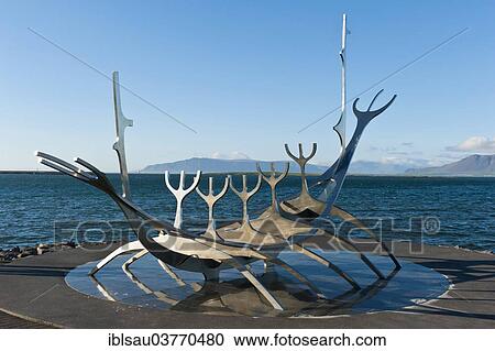Stock Image - "The Sun Voyager Sculpture or Solfar Sculpture by artist Jon Gunnar Arnason, a Viking ship made of stainless steel, Reykjavik, Iceland, Europe". Fotosearch