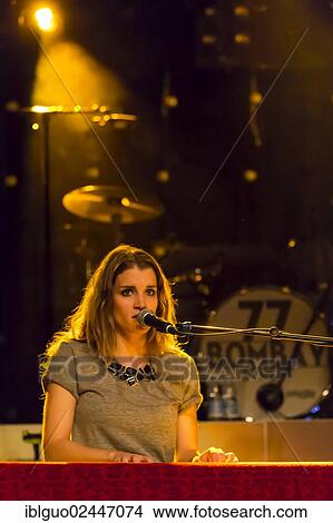 "The Swiss singer-songwriter Lina Button, performing live at the Schueuer in Lucerne, Switzerland, Europe" View Large Photo Image Picture - "The Swiss singer-songwriter Lina Button, performing live at the Schueuer in Lucerne, Switzerland, Europe". Fotosearch
