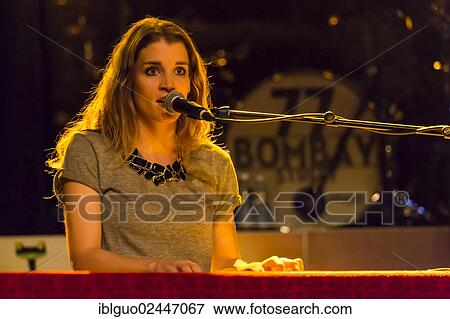 "The Swiss singer-songwriter Lina Button, performing live at the Schueuer in Lucerne, Switzerland, Europe" View Large Photo Image Stock Photo - "The Swiss singer-songwriter Lina Button, performing live at the Schueuer in Lucerne, Switzerland, Europe". Fotosearch