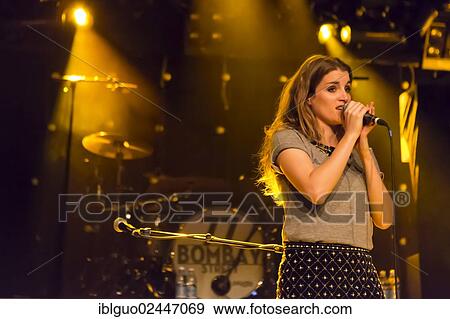 "The Swiss singer-songwriter Lina Button, performing live at the Schueuer in Lucerne, Switzerland, Europe" View Large Photo Image Stock Photo - "The Swiss singer-songwriter Lina Button, performing live at the Schueuer in Lucerne, Switzerland, Europe". Fotosearch