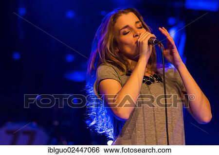 Stock Photograph - "The Swiss singer-songwriter Lina Button, performing live at the Schueuer in Lucerne, Switzerland, Europe". Fotosearch