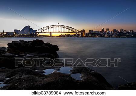Picture - "The Sydney Opera House and Harbour Bridge at dusk, Sydney, New South Wales, Australia, Oceania". Fotosearch