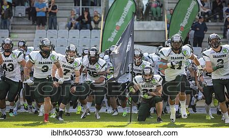 "The team of the Danube Dragons runs on the field before an Austrian Football League game, Tivoli Stadium, Innsbruck, Austria, Europe" View Large Photo Image Stock Image - "The team of the Danube Dragons runs on the field before an Austrian Football League game, Tivoli Stadium, Innsbruck, Austria, Europe". Fotosearch