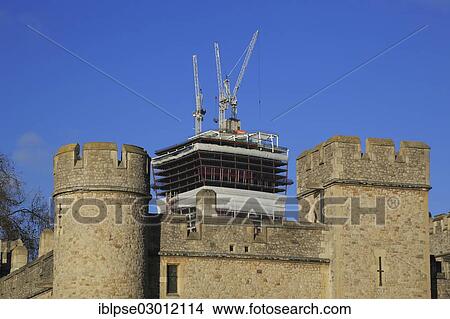 Picture - "The Tower of London in front of the high-rise construction site of 20 Fenchurch Street, City of London, London, London region, England, United Kingdom, Europe". Fotosearch