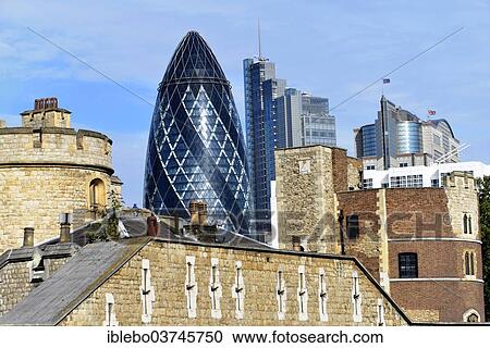 "The Tower of London, Waterloo Barracks, skyscraper 30 St Mary Axe or The Gherkin at back, London, England, United Kingdom, Europe" View Large Photo Image Stock Image - "The Tower of London, Waterloo Barracks, skyscraper 30 St Mary Axe or The Gherkin at back, London, England, United Kingdom, Europe". Fotosearch