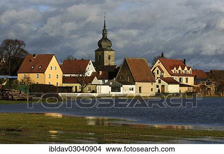 "The town of Uehlfeld with flooded Aisch meadows, Uehlfeld, Bavaria, Germany, Europe" View Large Photo Image Picture - "The town of Uehlfeld with flooded Aisch meadows, Uehlfeld, Bavaria, Germany, Europe". Fotosearch