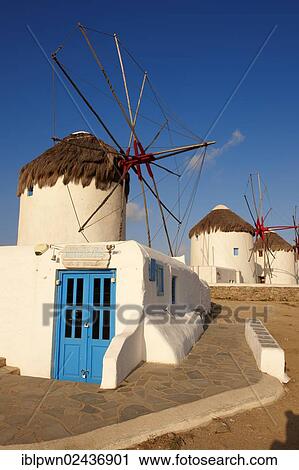 Stock Image - "The traditional Greek windmills of Mykonos Chora, Cyclades Island, Greece, Europe". Fotosearch