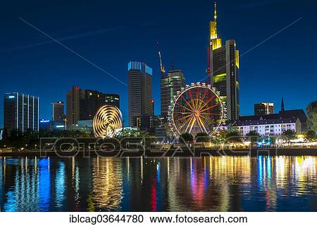 "The traditional Main Festival with rides and ferris wheel in front of the Frankfurt skyline, from the south bank of the Main River, Frankfurt am Main, Hesse, Germany, Europe" View Large Photo Image Stock Image - "The traditional Main Festival with rides and ferris wheel in front of the Frankfurt skyline, from the south bank of the Main River, Frankfurt am Main, Hesse, Germany, Europe". Fotosearch