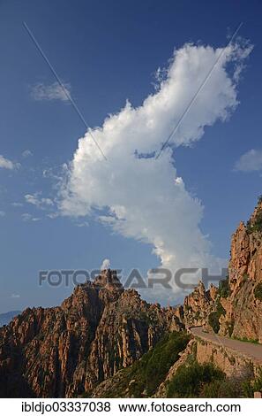 "The typical bizarre red rocks of the Calanche of Piana below a blue sky and some clouds. The Calanche of Piana is in the western part of the island Corsica, France, Calanques de Piana, Piana, Corsica, France, Europe" View Large Photo Image Stock Photo - "The typical bizarre red rocks of the Calanche of Piana below a blue sky and some clouds. The Calanche of Piana is in the western part of the island Corsica, France, Calanques de Piana, Piana, Corsica, France, Europe". Fotosearch
