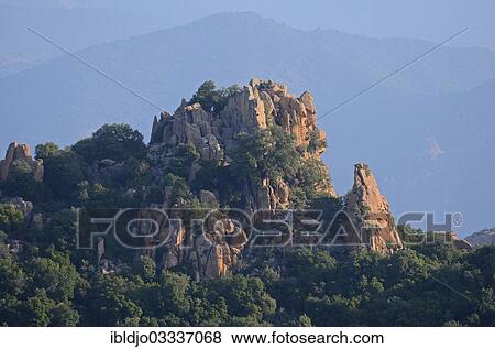"The typical bizarre red rocks of the Calanche of Piana below a blue sky. The Calanche of Piana is in the western part of the island Corsica, Corse-du-Sud, France, Calanques de Piana, Piana, Corsica, France, Europe" View Large Photo Image Stock Photo - "The typical bizarre red rocks of the Calanche of Piana below a blue sky. The Calanche of Piana is in the western part of the island Corsica, Corse-du-Sud, France, Calanques de Piana, Piana, Corsica, France, Europe". Fotosearch