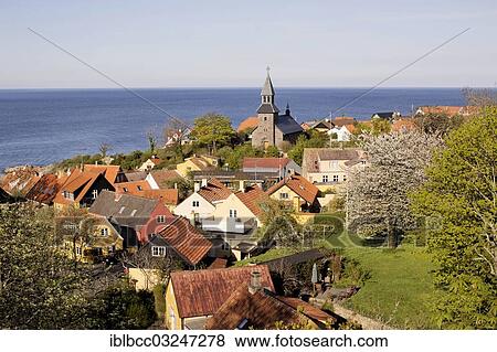 "The village church of Gudhjem on the Baltic Sea, Bornholm, Gudhjem |Gudhjem|, Region Hovedstaden, Denmark, Europe" View Large Photo Image Stock Photo - "The village church of Gudhjem on the Baltic Sea, Bornholm, Gudhjem |Gudhjem|, Region Hovedstaden, Denmark, Europe". Fotosearch