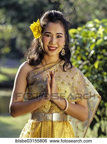 "The Wai, a Thai gesture of greeting, young woman wearing a traditional costume, Rose Garden, Thailand, Asia" View Large Photo Image Stock Photograph - "The Wai, a Thai gesture of greeting, young woman wearing a traditional costume, Rose Garden, Thailand, Asia". Fotosearch