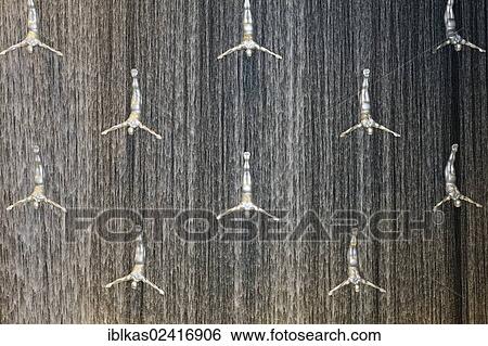 The Waterfall, an artificial indoor waterfall with life-size sculptures of divers, Dubai Mall, United Arab Emirates, Middle East, Asia View Large Photo Image Stock Photograph - The Waterfall, an artificial indoor waterfall with life-size sculptures of divers, Dubai Mall, United Arab Emirates, Middle East, Asia. Fotosearch