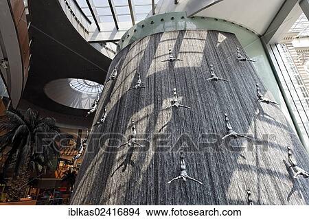 The Waterfall, artificial indoor waterfall with life-size sculptures of divers, Dubai Mall shopping centre, United Arab Emirates, Middle East, Asia View Large Photo Image Picture - The Waterfall, artificial indoor waterfall with life-size sculptures of divers, Dubai Mall shopping centre, United Arab Emirates, Middle East, Asia. Fotosearch